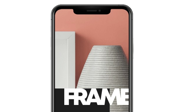 A phone with a picture on its screen that includes various items and shows the word 'Frame'